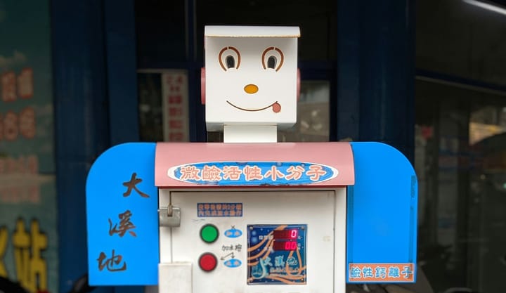 Smiling robot with buttons